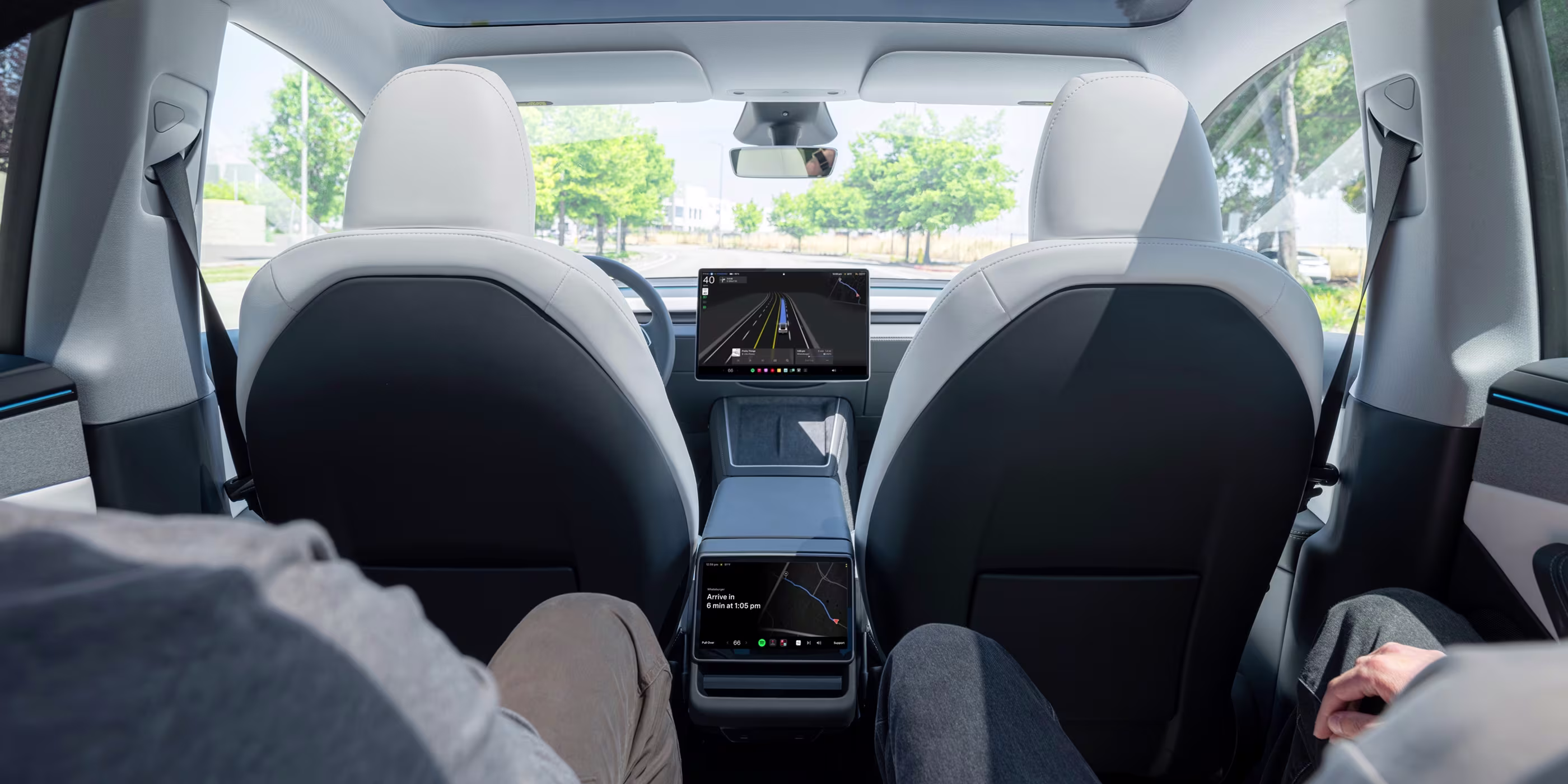 Interior of a Tesla vehicle with a view of the road