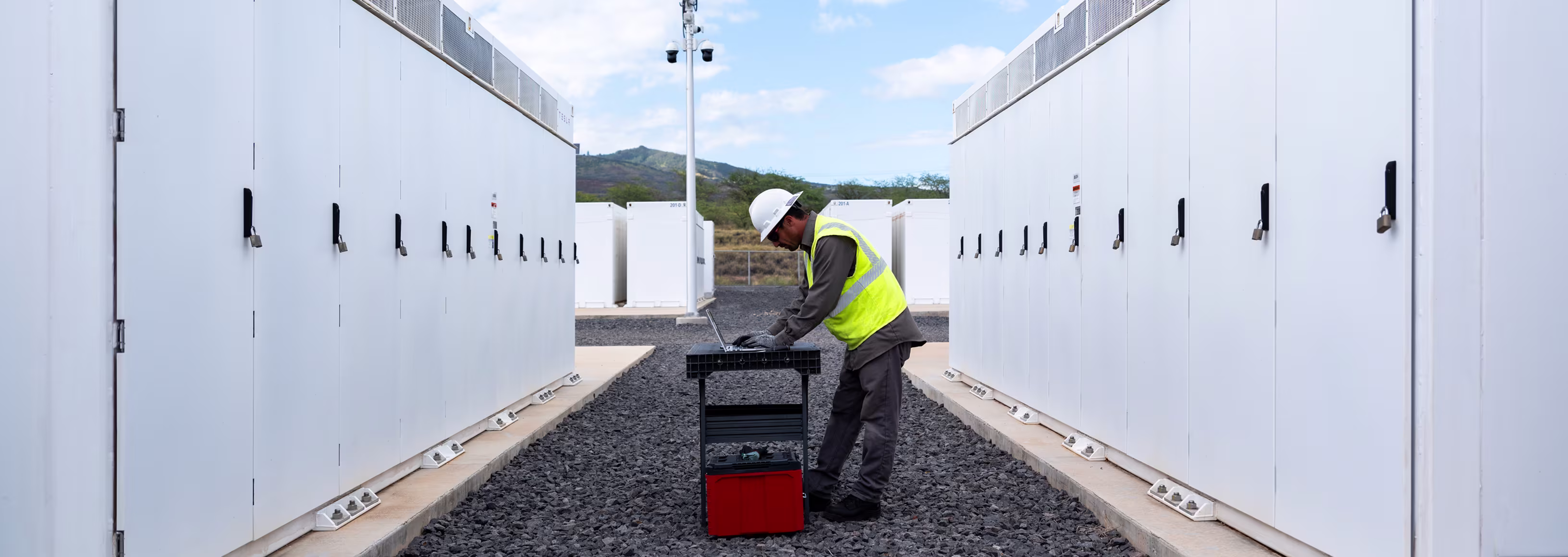 A service technician at a Megapack site