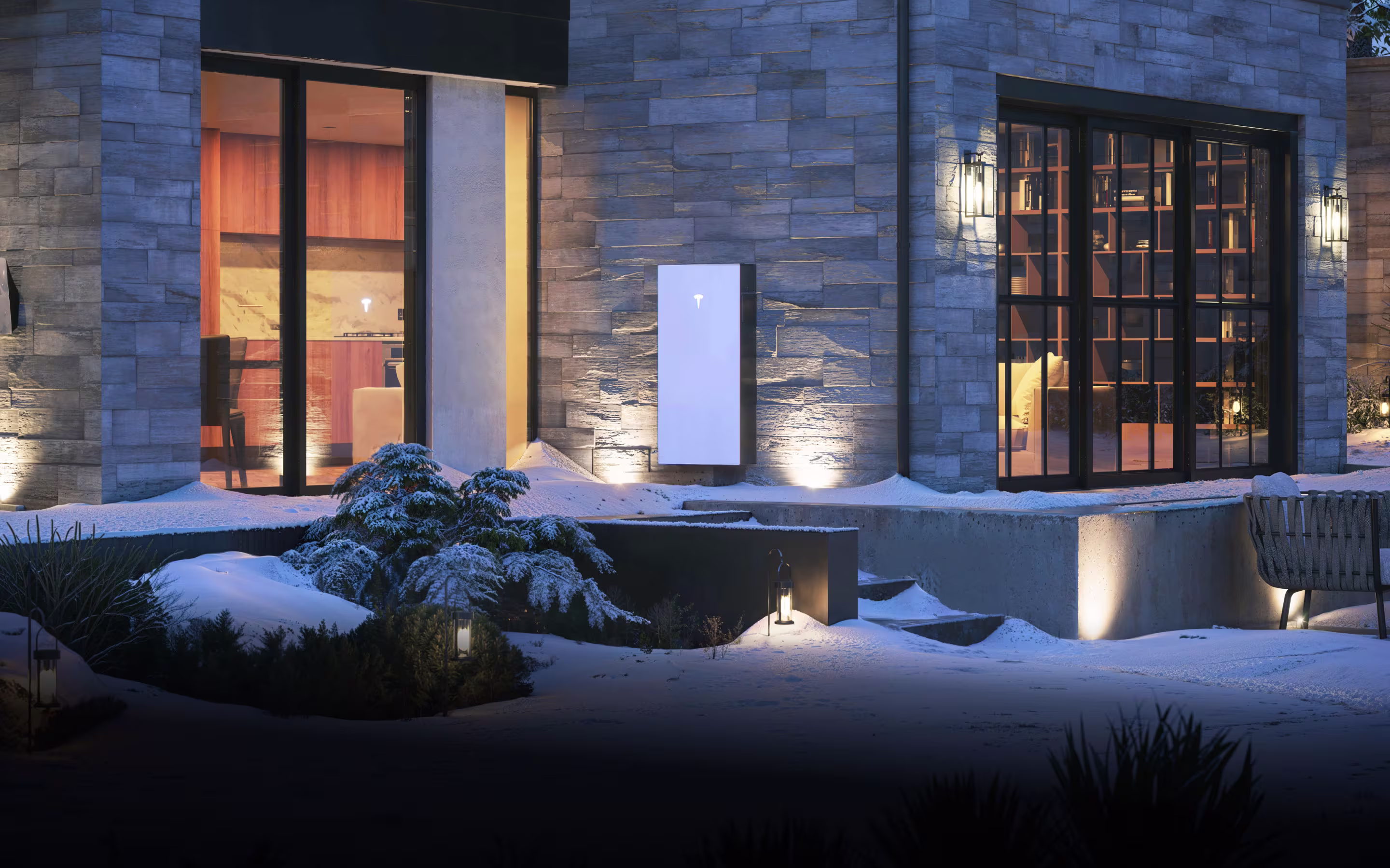 Home lit up during a storm with a Powerwall 3 installed outside